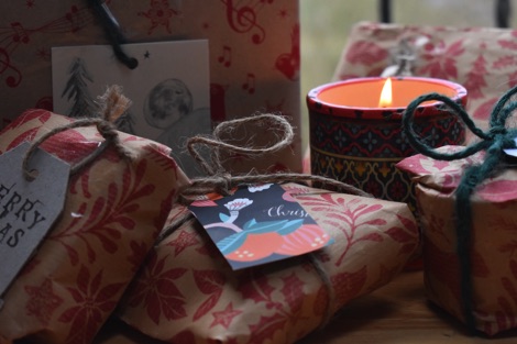 Wrapped presents with candle
